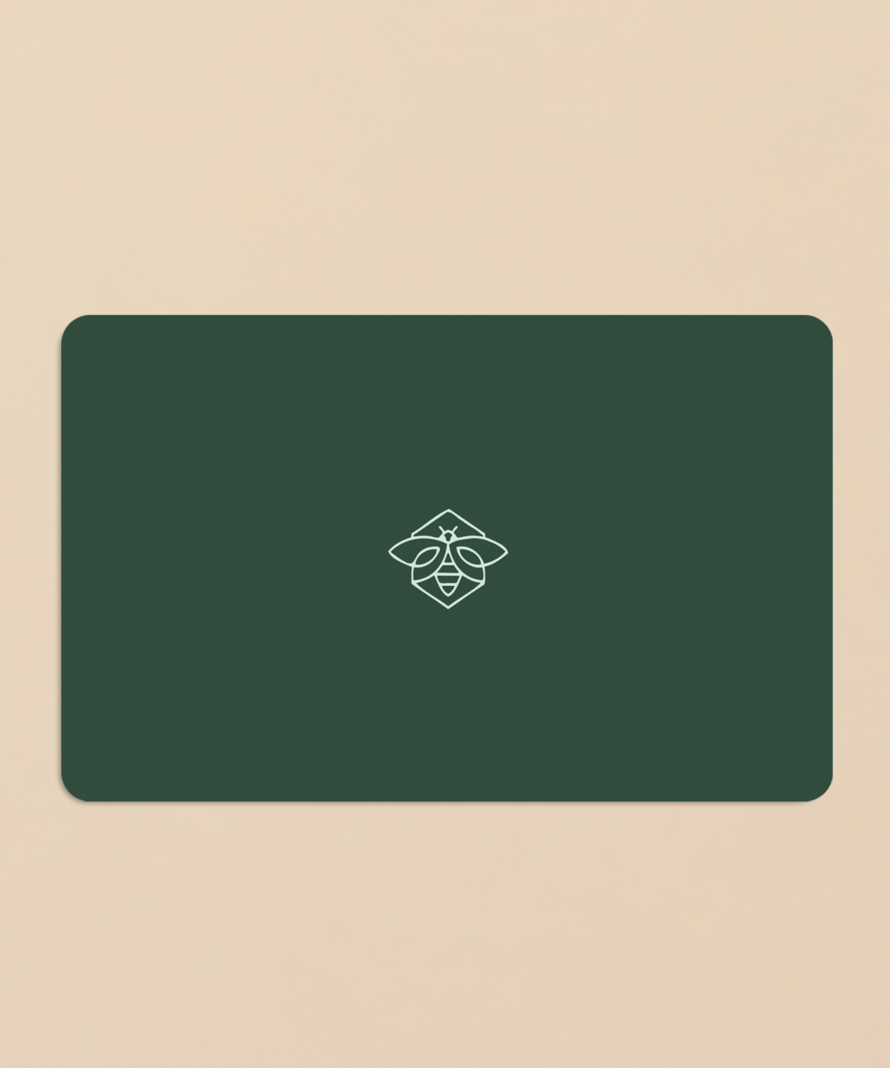 Green Practical Alchemy gift card with bee logo on a beige background
