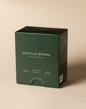 Closed green box of Purify + Protect Duo sachets on a beige background